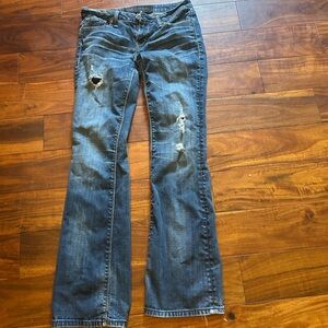 Distressed cult of individuality jeans